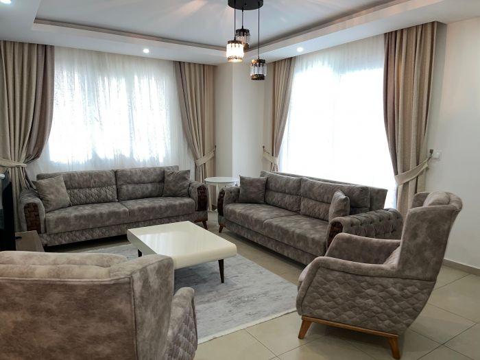 Chill on the comfortably spacious sofa set.