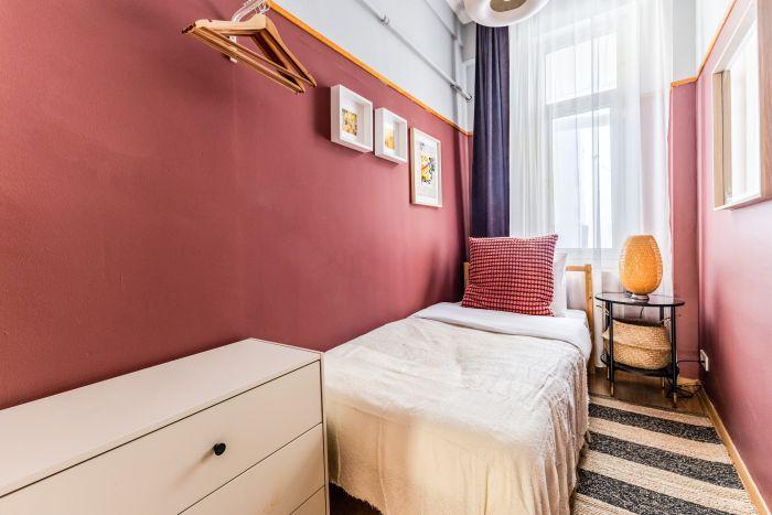 Awesome combination of maroon and white awaits you in the second bedroom.