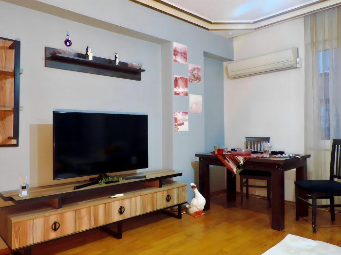 The living room includes an AC, so there is no need to worry about boiling days in Antalya.