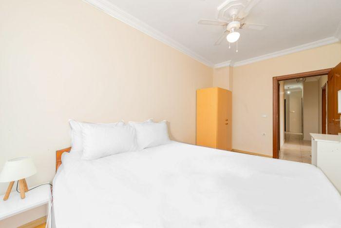 Relax and unwind in the comfort of our stylish and spacious bedroom.