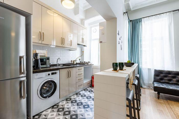 The kitchen is fully equipped with necessary white goods and appliances.