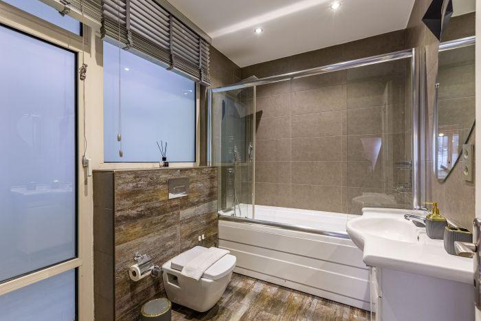 Our bathroom is sleek, clean and hygienic.