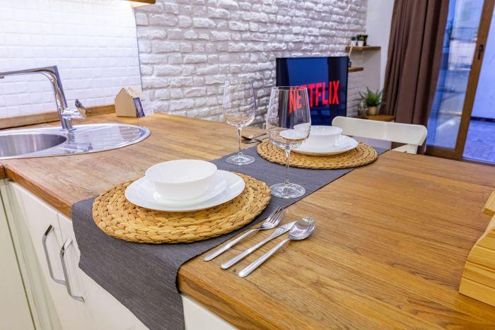 You can savor delicious dishes and delightful conversations in this dining space.