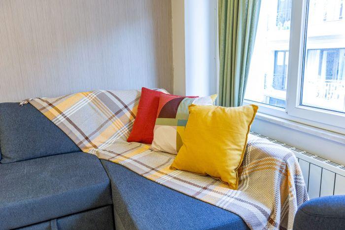 Or you can snuggle up here in this cushy corner and unwind.