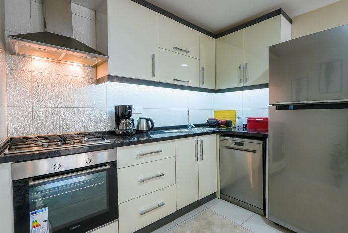 Our modern kitchen is fully equipped.
