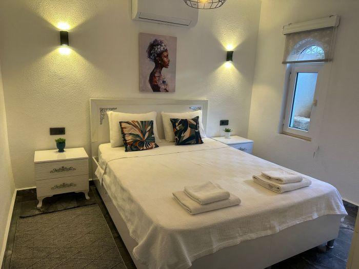 Our main bedroom features a comfy double bed for relaxation.