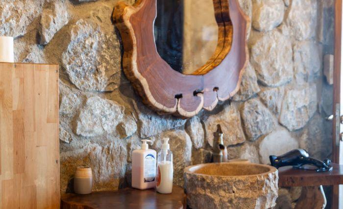 Our bathroom has a unique rustic style complimenting the rest of the house.