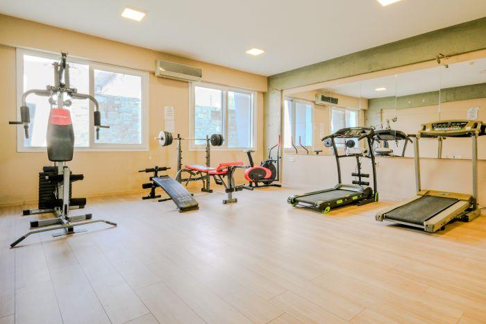 A well-equipped gym, filled with state-of-the-art fitness equipment, catering to all workout routines and promoting a healthy lifestyle.
