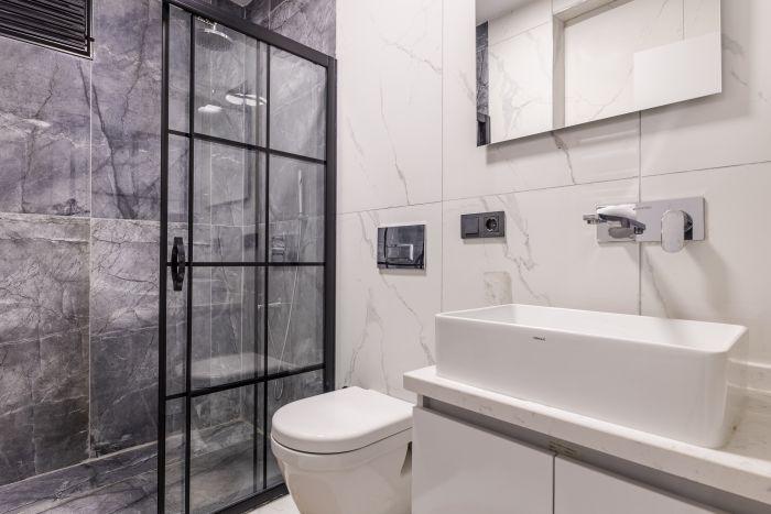 Refresh yourself in the spacious and zestfully furnished shower cabin.