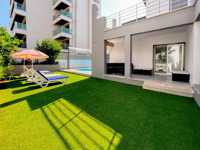 Unwind in our luxurious Villa, featuring a lush, sprawling garden.
