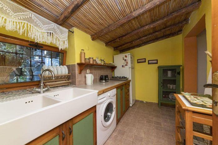 Authentic kitchen with all the essentials including kettle and toaster.