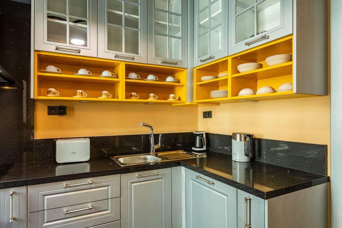 The kitchen is well-designed and fully equipped for your satisfaction.