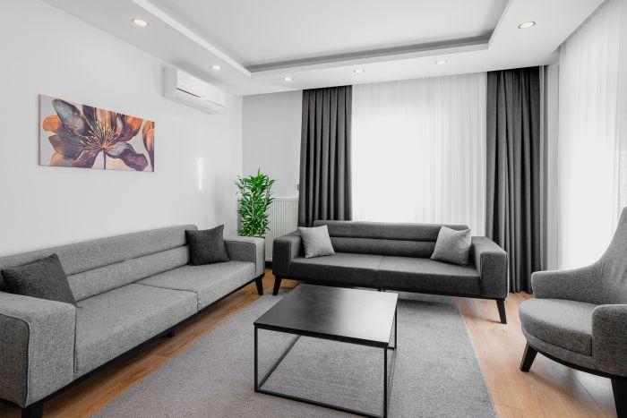 Our spacious living room features all the necessary amenities to make you feel at home. 
