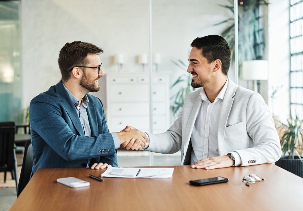 property manager hand shaking with landlord